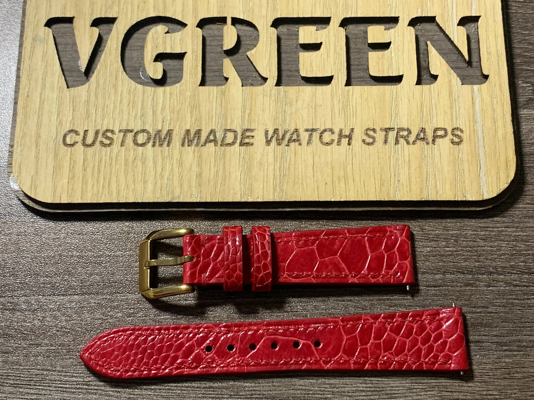 Red ostrich leg leather watch strap for a Cartier Tank with a 14mm gold buckle