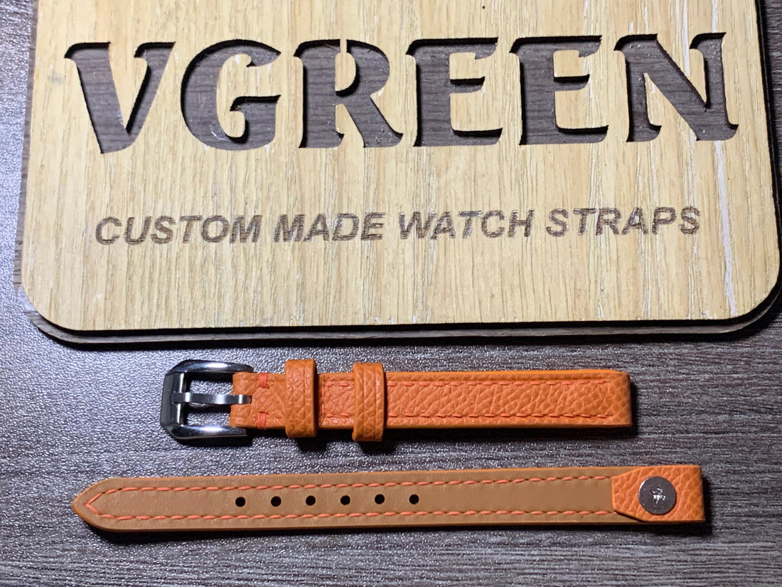 Orange Epsom open-ended watch strap for a 1919 Omega trench watch