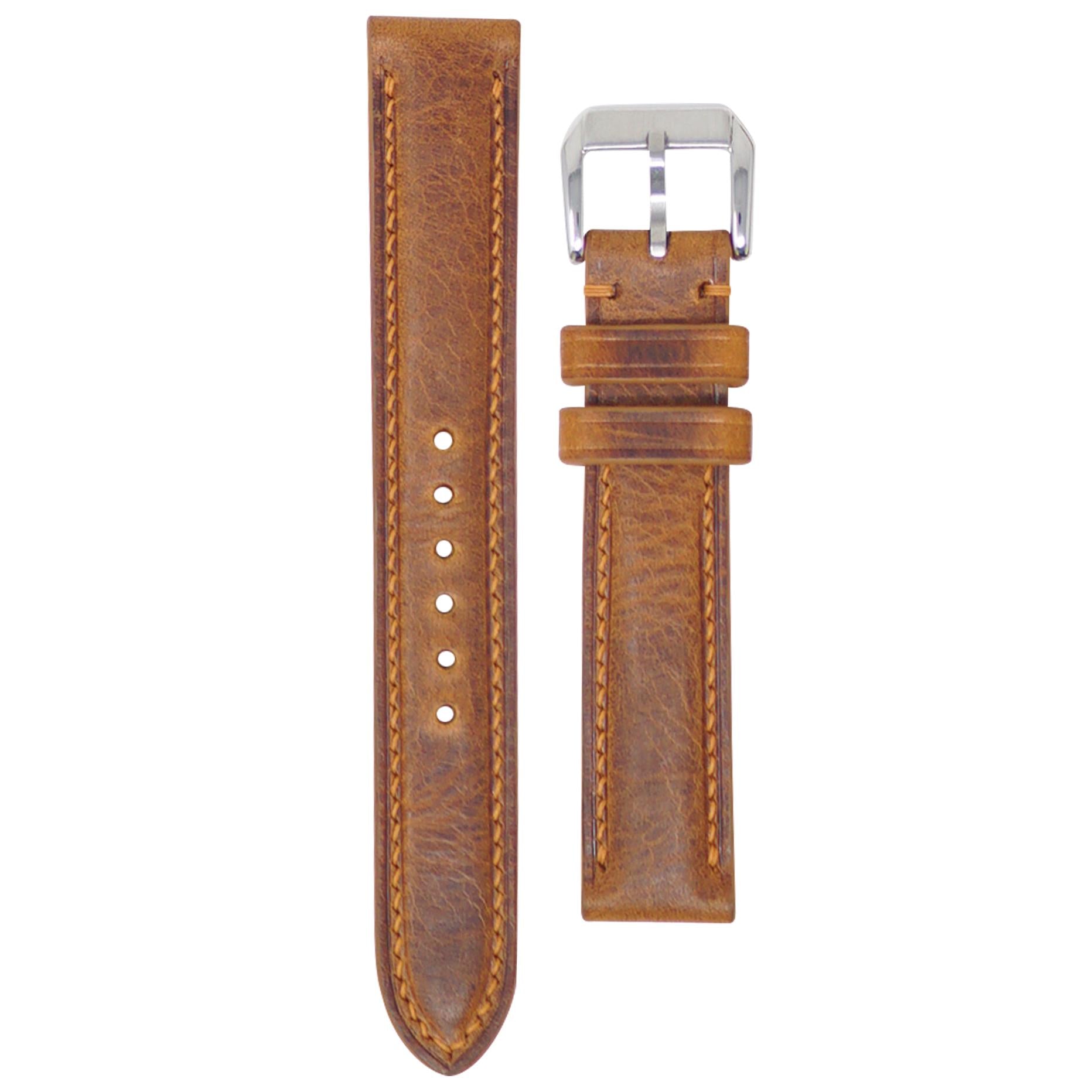 Cognac Badalassi Wax leather watch strap, 17mm, with light brown stitching and a silver buckle, flat lay.