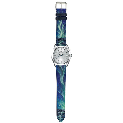 Hand-painted aurora, mountain and river detail on a deep blue leather watch strap.