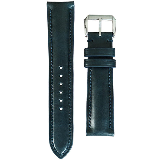 Deep teal Buttero leather watch strap with matching stitching and silver buckle, flat lay.