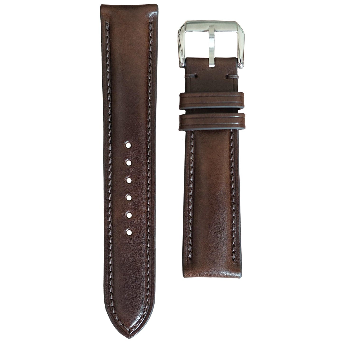 Dark brown Buttero leather watch strap with white stitching and a silver buckle, flat lay.