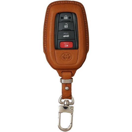 Brown Vachetta leather key fob cover for Toyota Camry, with a silver carabiner clip.