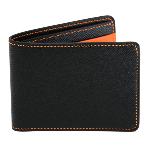 Black Epsom leather bifold wallet with orange stitching and interior, slightly open.