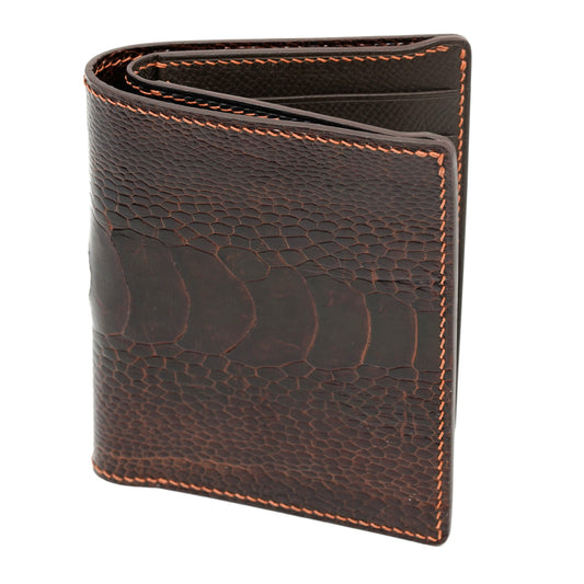 Dark brown ostrich leg leather vertical bifold wallet with orange stitching.