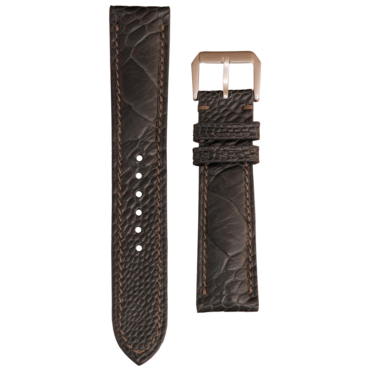 Dark gray ostrich leg leather watch strap with light brown stitching and a silver buckle, flat lay.