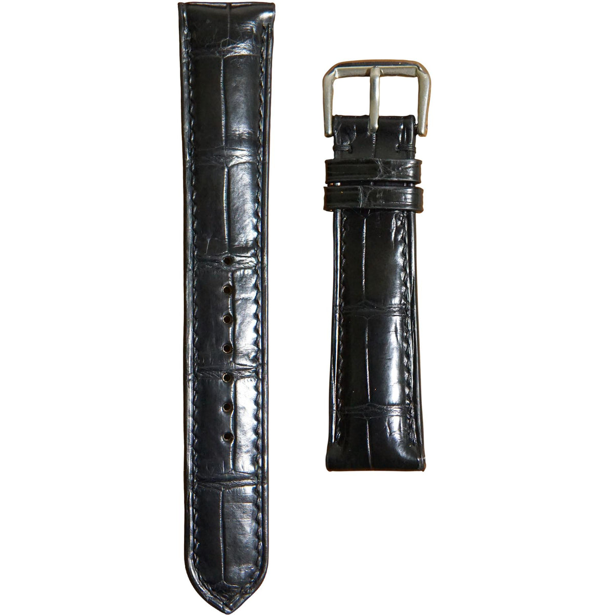 Black crocodile leather watch strap with matching stitching and silver buckle, flat lay.
