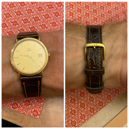 Brown crocodile leather watch strap fitted to a gold Omega dress watch, with watch-face and buckle views.