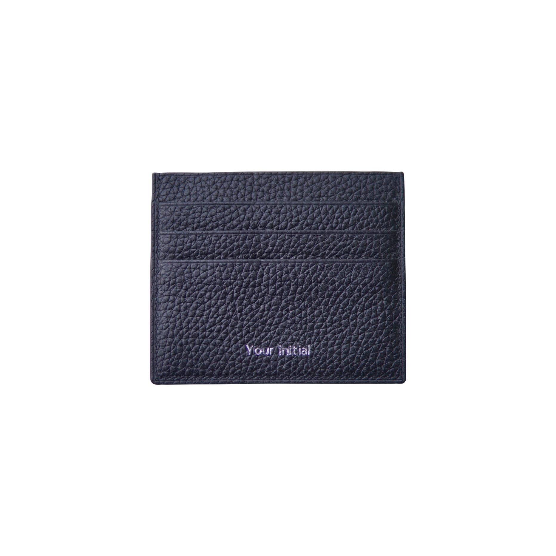 Black pebbled calfskin card holder with "Your initial" embossed in purple.