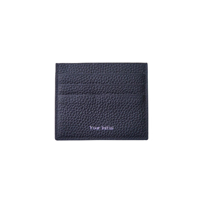 Black pebbled calfskin card holder with "Your initial" embossed in purple.