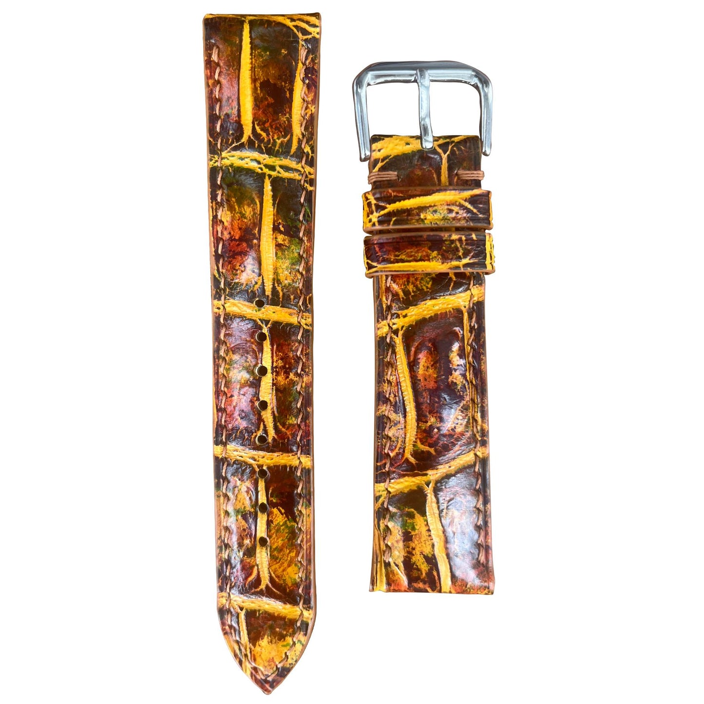 Brown and yellow crocodile leather watch strap with silver buckle, flat lay.