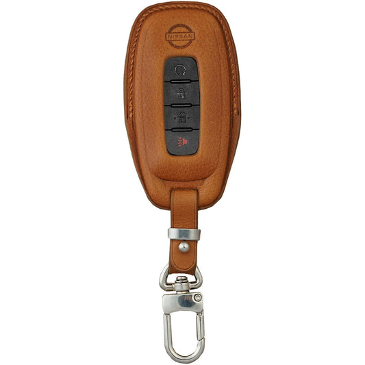 Brown Vachetta leather key fob cover for Nissan Rogue, with silver hardware and visible buttons.