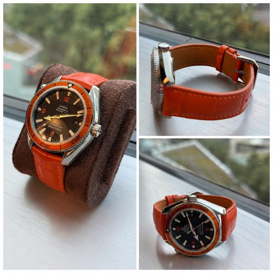 Three customer views of an Omega Seamaster 600M fitted with a custom orange curved-end alligator leather watch strap by VGreen