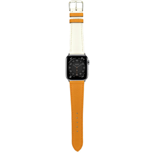 Orange and white Swift leather watch strap with an Apple Watch, flat lay.