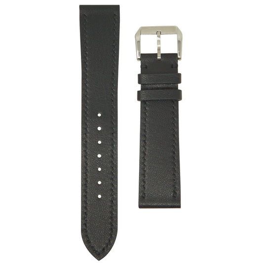 Black vegan leather watch strap with matching stitching and a silver buckle, flat lay.