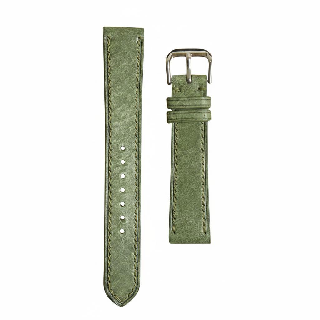 Dark green Maya leather watch strap with light green stitching and silver buckle, flat lay.