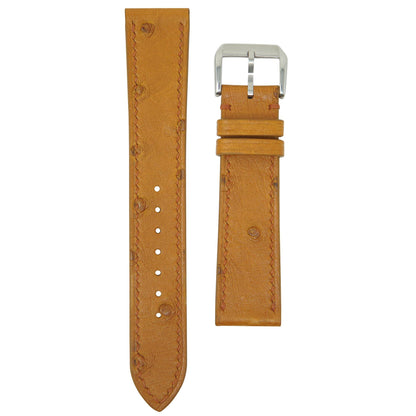 Brown ostrich leather watch strap with orange stitching and silver buckle, flat lay.