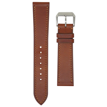 Brown Buttero leather watch strap with light brown stitching and a silver buckle, flat lay.