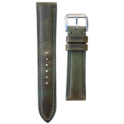 Olive green Badalassi Wax leather watch strap with light stitching and silver buckle, flat lay.