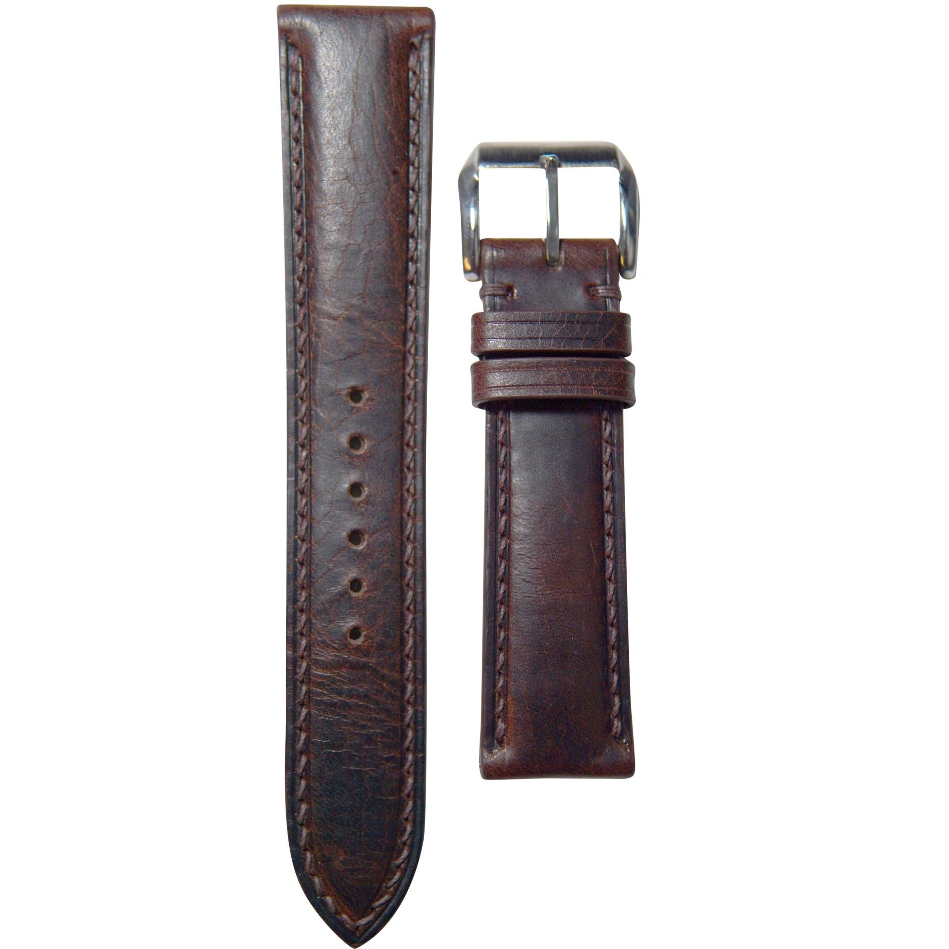 Dark brown Badalassi Wax leather watch strap with matching stitching and silver buckle, flat lay.