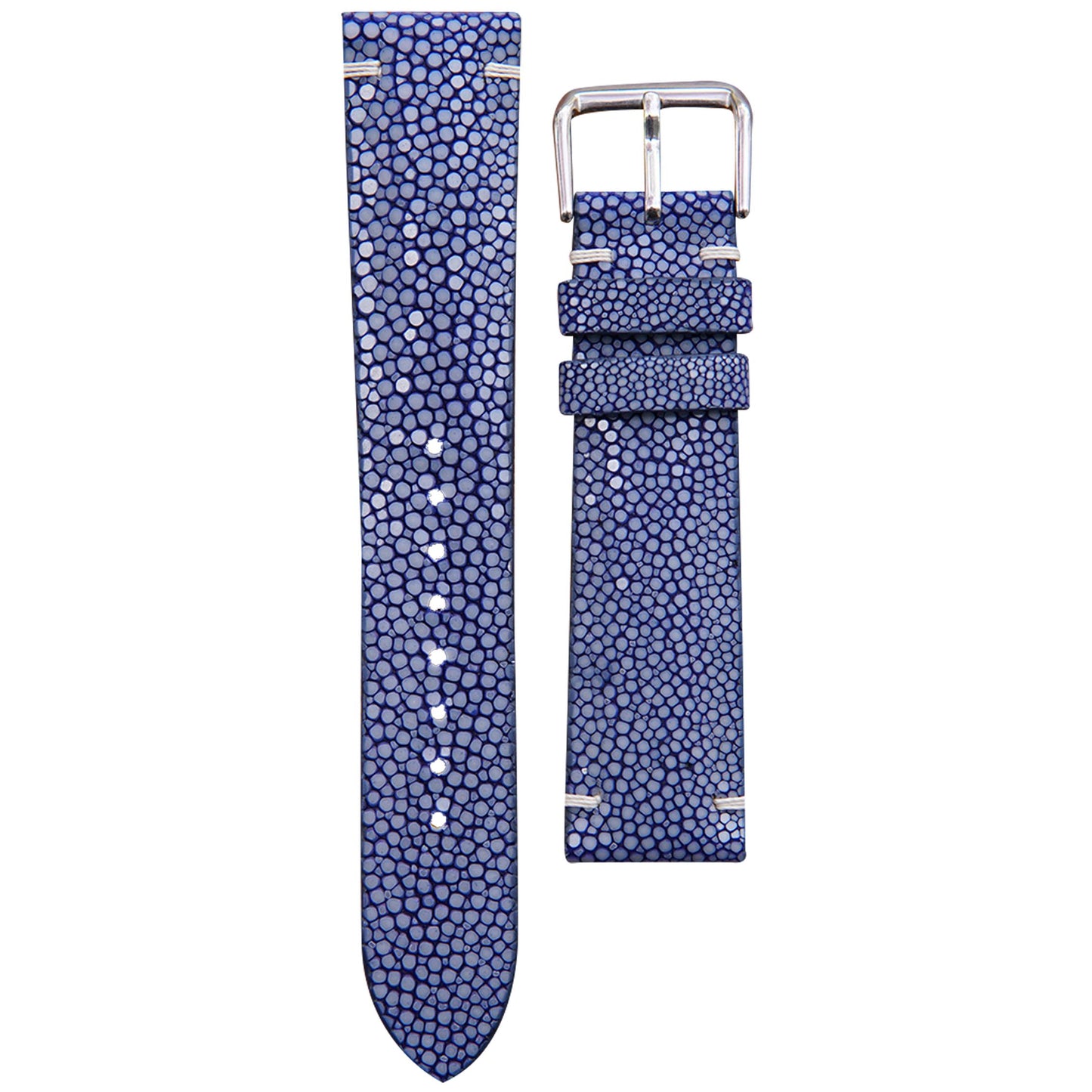 Blue stingray leather watch strap with white stitching and silver buckle, flat lay.