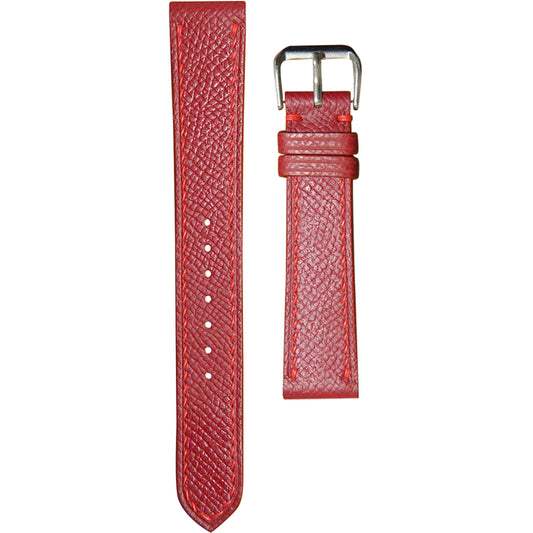 Red Epsom leather watch strap with matching red stitching and a silver buckle, flat lay.