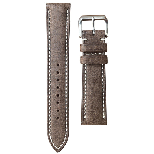 Babele T-Moro linen leather watch strap with white stitching and silver buckle, flat lay.