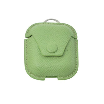 Green Epsom leather Airpods case with matching stitching and a silver keyring, front view.