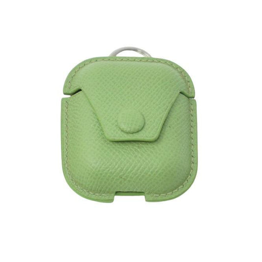 Green Epsom leather Airpods case with matching stitching and a silver keyring, front view.