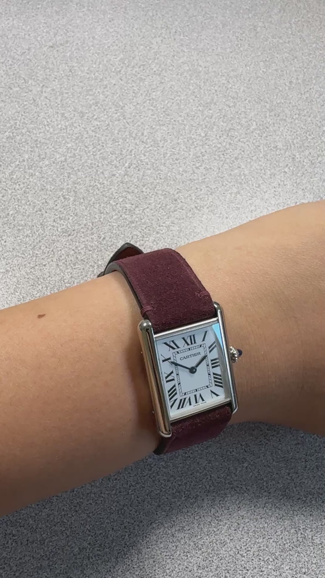 Maroon suede leather strap for Cartier Tank Must, on the wrist