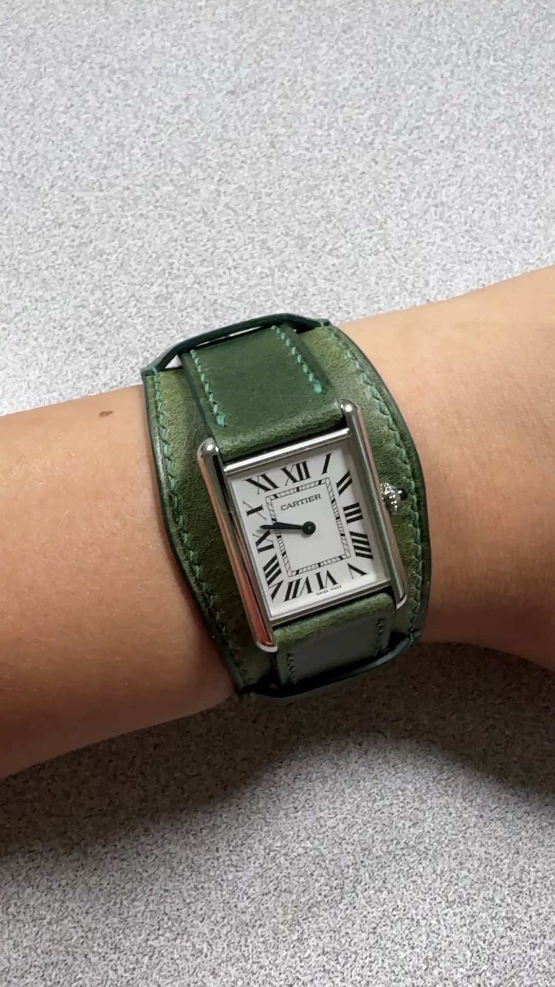 Green Buttero leather bund strap for Cartier Tank Must, on the wrist