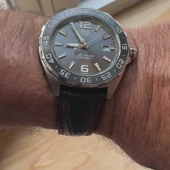 Customer video showing a black shark skin watch strap with red stitching fitted to a TAG Heuer watch.