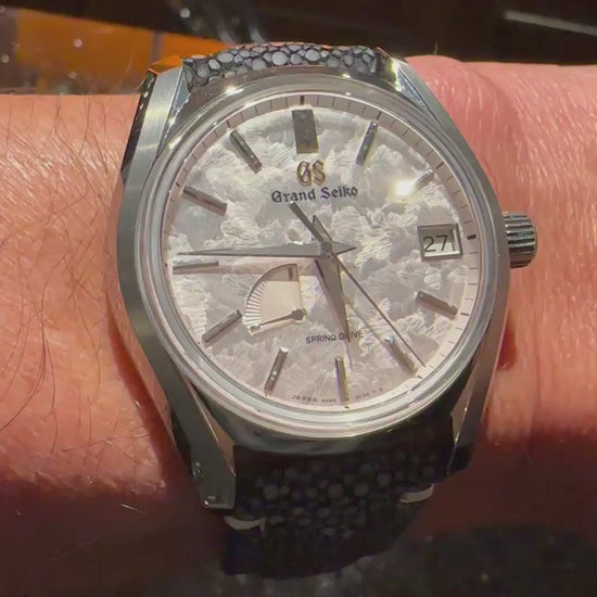 Real customer video showing a black stingray leather watch strap on the wrist and its natural pearl texture.