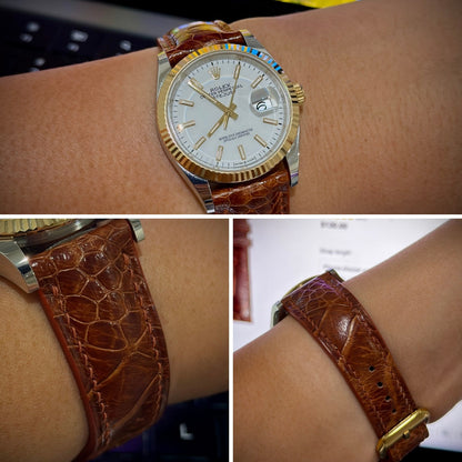 Customer wrist, leather grain and buckle views of a Rooibos Tea ostrich leg leather watch strap on a two-tone watch.
