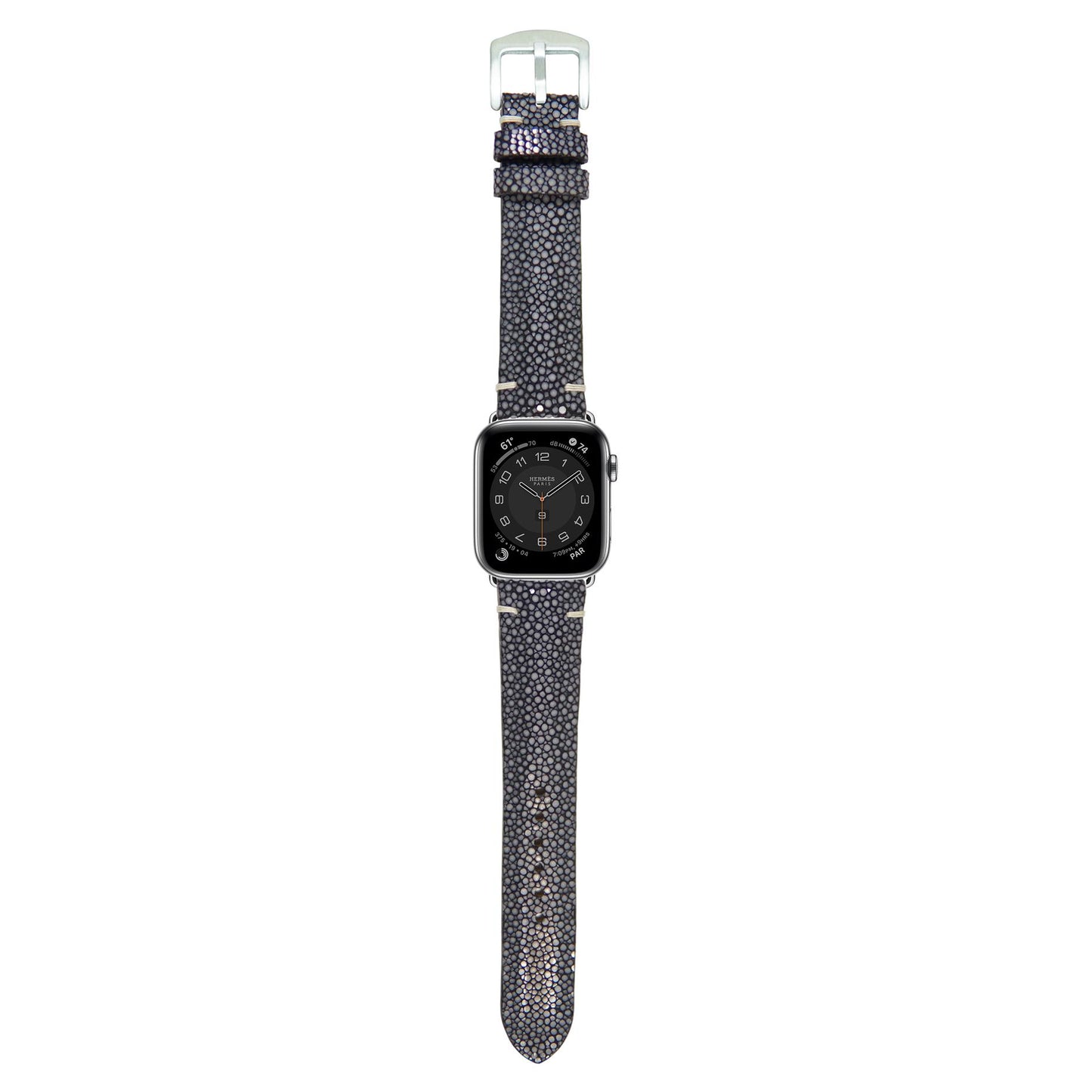 Black stingray leather watch strap with light stitching and silver buckle, flat lay.